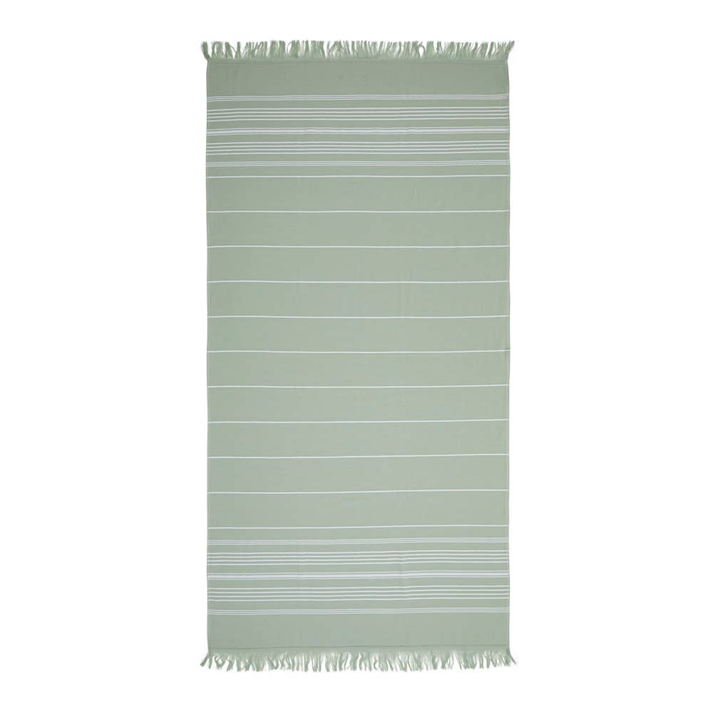 A sage green woven towel with thin white horizontal stripes and fringed edges on both ends, shown flat against a solid white background.